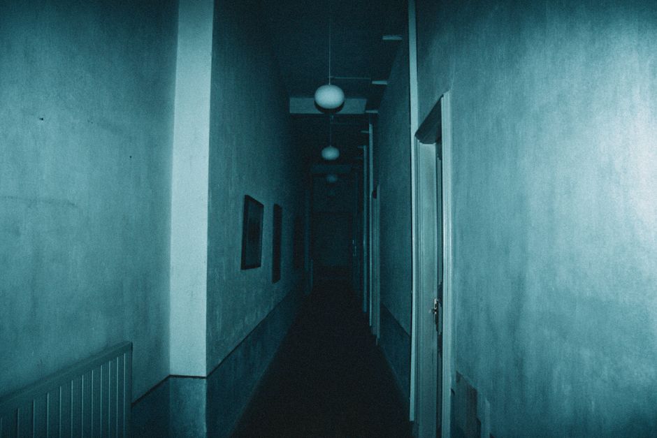 dark sci-fi horror corridor, underwater research facility, eerie abandoned lab