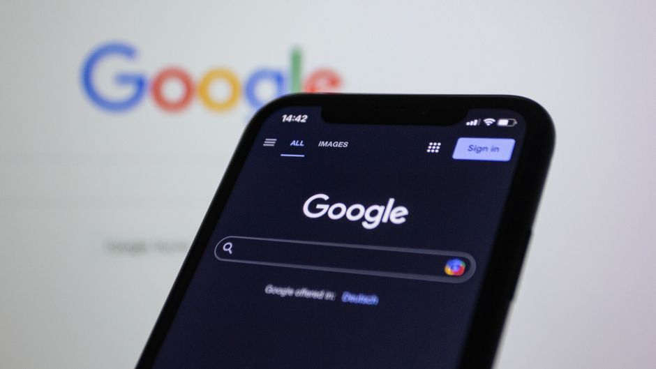 smartphone displaying online ad, google search interface, ai generated imagery