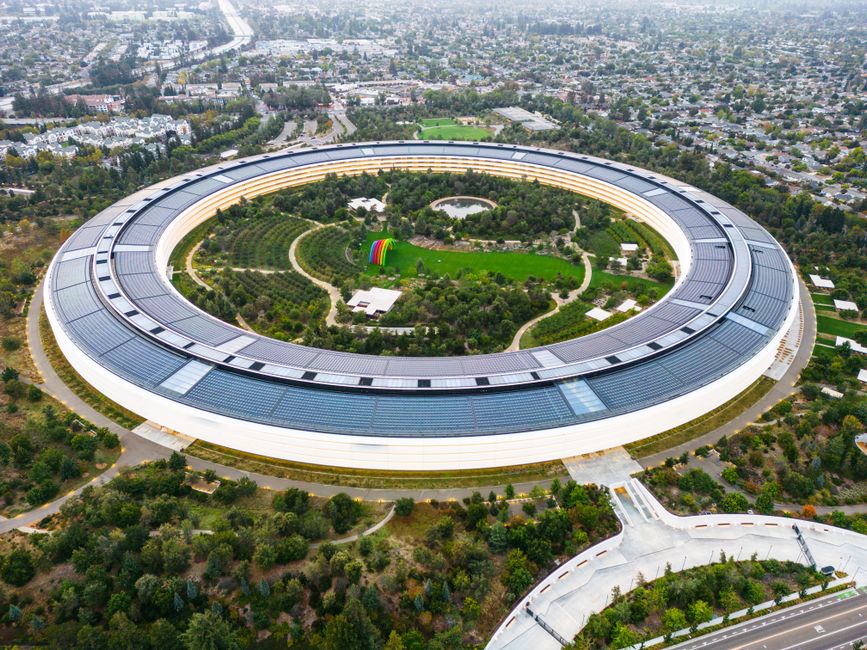 courthouse gavel technology, smartphone silhouette, apple headquarters exterior
