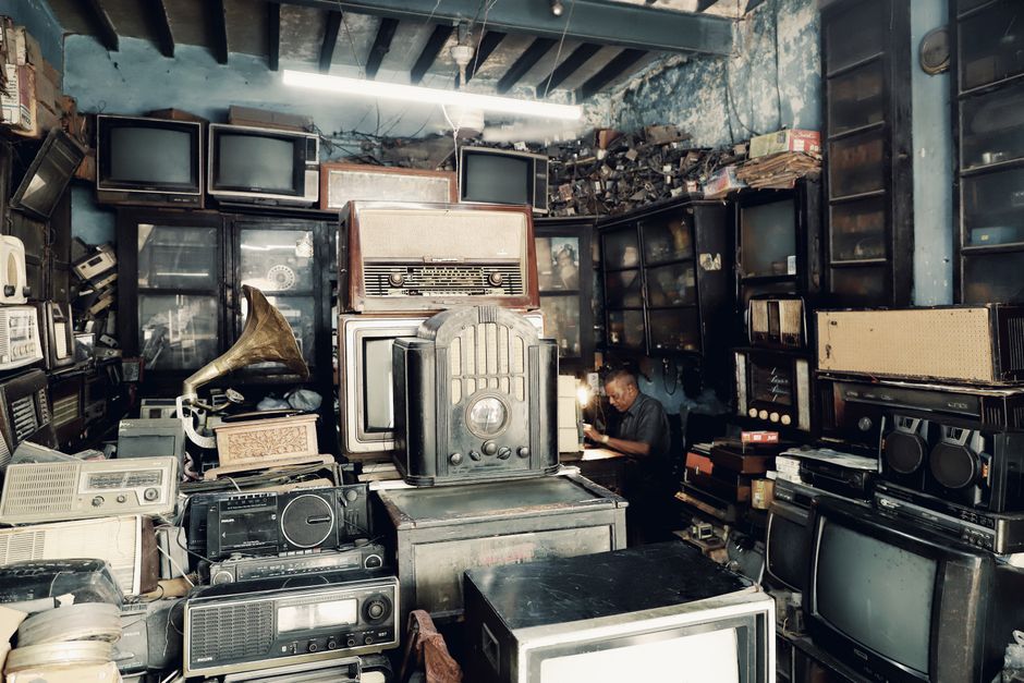 tropical jungle island, vintage television camera, remote radio tower