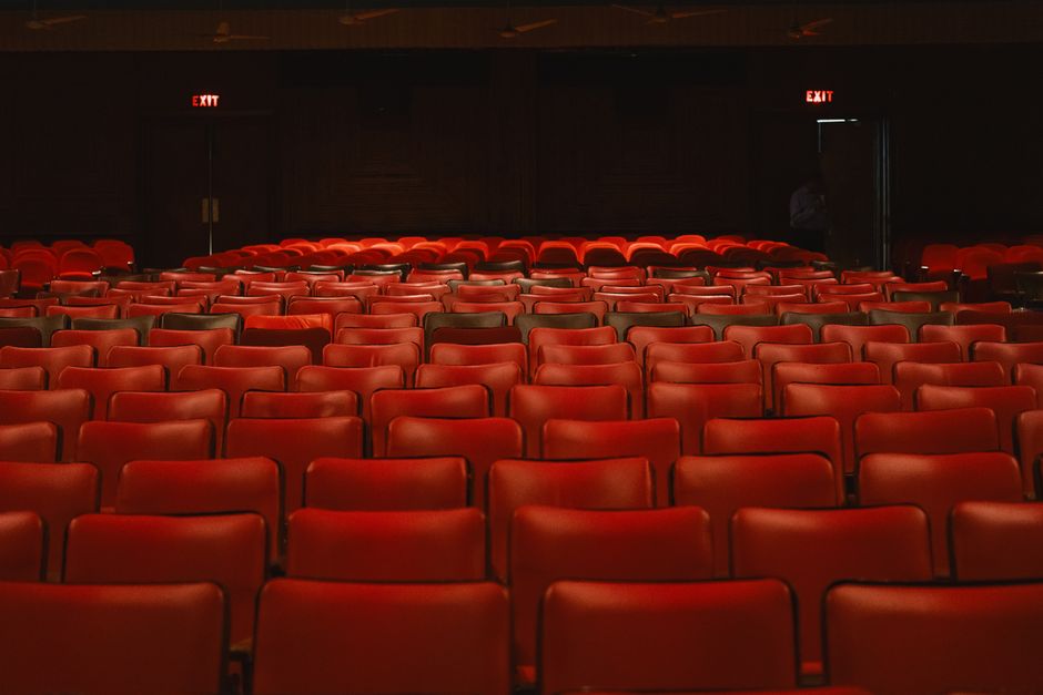 comic book panels close-up, retro television static, empty movie theater seats