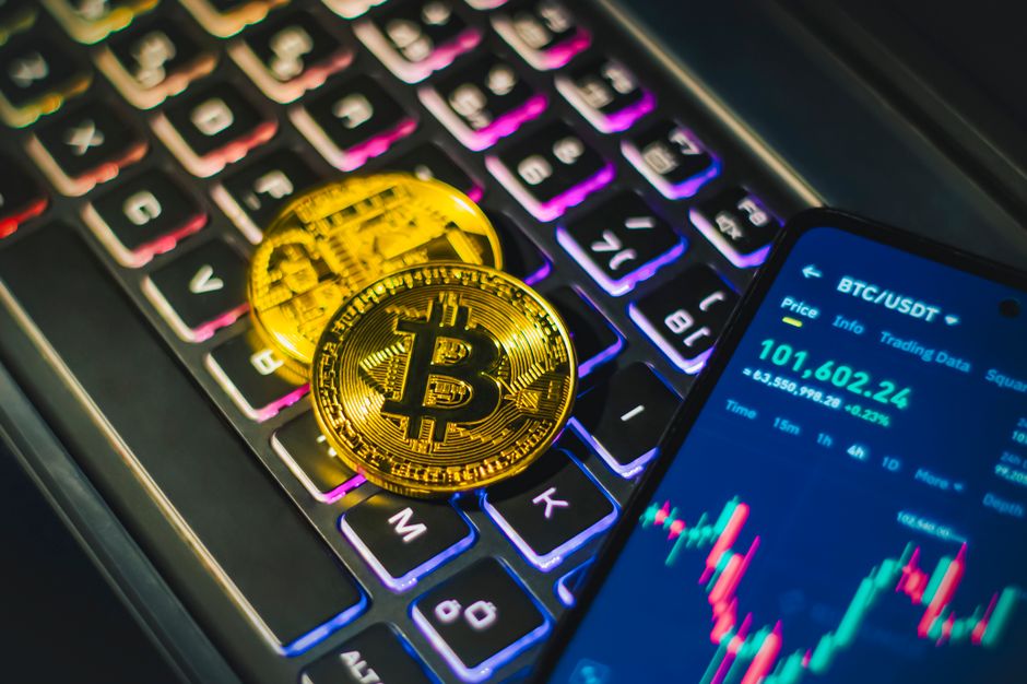 smartphone twitter app screen, cryptocurrency coins dark, hacker keyboard
