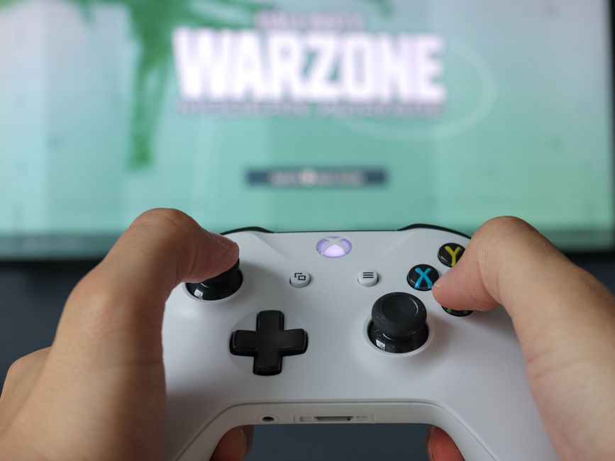 strategy game controller closeup, tactical squad video game screen