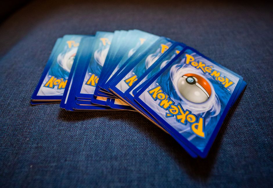 trading card packs, pokemon cards collection, cinema marquee