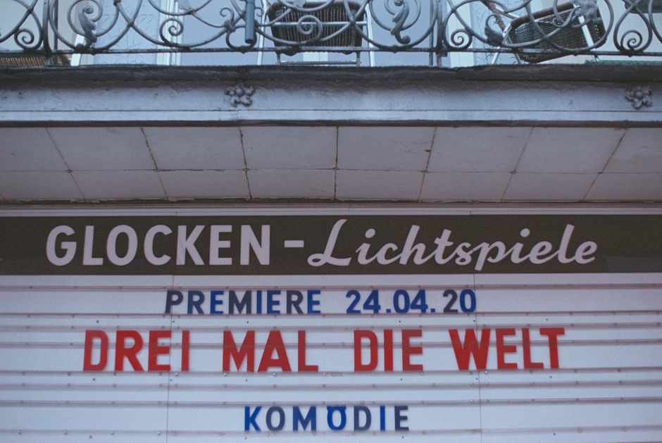 movie theater marquee, film premiere red carpet, comic book pages