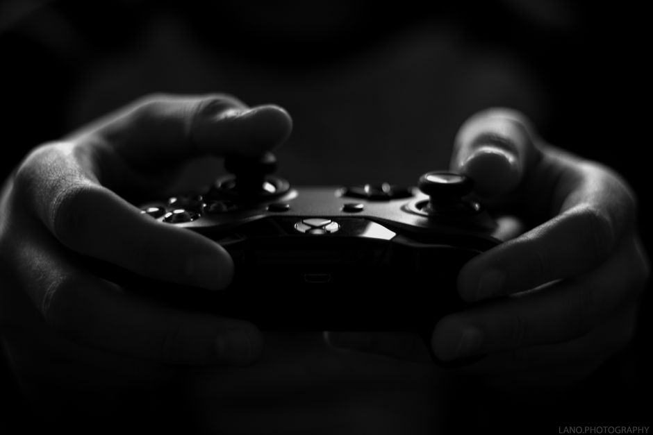 gothic castle at dusk, vampire fangs silhouette, video game controller dark