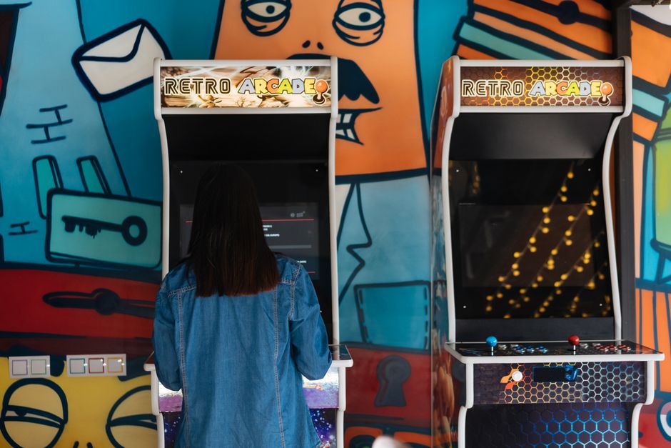 tetris blocks, retro arcade screen, white house exterior